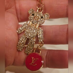 Upcycled Louis Vuitton Red Charm onto  Gold Tone Bling Bear Keychain